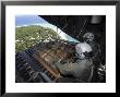 Airmen Push Out A Pallet Of Donated Goods Over The Island Of Yap From C-130 Hercules, Dec 19, 2008 by Stocktrek Images Limited Edition Print