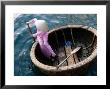 Woman Rows Basket Boat On Vietnam's South Central Coast, Nha Trang, Khanh Hoa, Vietnam by Stu Smucker Limited Edition Print