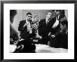 Senator John F. Kennedy Talking On The Phone Surrounded By Aides During The Primary Elections by Stan Wayman Limited Edition Pricing Art Print