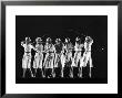 Saks Fifth Avenue Fashion Shot Of Model Swinging Golf Club by Gjon Mili Limited Edition Pricing Art Print