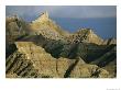 Dramatic Peaks Dominate A Portion Of Badlands National Park by Annie Griffiths Belt Limited Edition Print