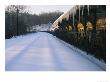 A Pristine Blanket Of Snow Covers An Empty Train Station by Nick Caloyianis Limited Edition Pricing Art Print