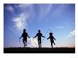 Silhouette Of Children Playing Outdoors by Mitch Diamond Limited Edition Print