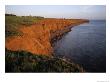 The Red Cliffs Of Prince Edward Island At Sunset Glow, Prince Edward Island, Canada by Taylor S. Kennedy Limited Edition Pricing Art Print
