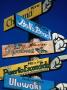 Sign Pointing To Famous Surfing Spots From Around The World, Pichilemu, Chile by Paul Kennedy Limited Edition Print