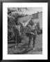 Teenage Twin Girls Hanging Laundry On Clothesline by Nina Leen Limited Edition Pricing Art Print