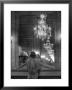 Model In Ostrich Feather Trimmed Gown Pausing To Regard Herself In Grand Mirror Of Molyneux Atelier by Alfred Eisenstaedt Limited Edition Print