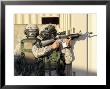 An Infantry Scout Aims His Weapon At Role-Playing Insurgents During A Cordon-And-Knock Operation by Stocktrek Images Limited Edition Print