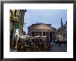 Restaurant And The Pantheon Illuminated At Dusk, Piazza Della Rotonda, Rome, Lazio, Italy, Europe by Ruth Tomlinson Limited Edition Print