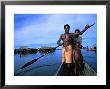 Local Sepik River Family In Dugout Canoe, Madang, Papua New Guinea by Michael Gebicki Limited Edition Print