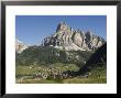 Italian Village Rimmed By Mountains In The Dolomites, Italy by Bill Hatcher Limited Edition Print