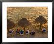 Guests Relax At Sunset Along The Water At The Caribe Blu Hotel, Cozumel, Mexico by Michael S. Lewis Limited Edition Print