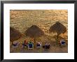 Guests Relax At Sunset Along The Water At The Caribe Blu Hotel, Cozumel, Mexico by Michael S. Lewis Limited Edition Print