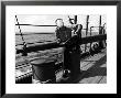 Sailor Relaxing Aboard A Us Navy Cruiser At Sea While Reading A Copy Of Life Magazine During Wwii by Ralph Morse Limited Edition Pricing Art Print