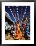 Girls Dancing A Sevillana Beneath Colourful Lanterns, Feria De Abril, Seville, Andalucia, Spain by Ruth Tomlinson Limited Edition Print
