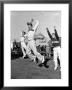 Male Cheerleaders In Action At Wisconsin-Marquette Football Game by Alfred Eisenstaedt Limited Edition Print