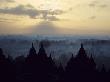 The Temple Of Borobodur At Dawn, Backdrop Of Mist-Shrouded Volcanoes, Borobodur, Unesco World Herit by Lizzie Shepherd Limited Edition Print