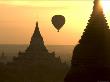 Temples And Hot-Air Balloon Silhouetted At Sunrise by Jerry Alexander Limited Edition Print