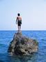 Boy Standing Alone On Rock, Italy by Terri Froelich Limited Edition Pricing Art Print