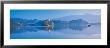 Reflection Of Mountains And Buildings In Water, Lake Bled, Slovenia by Panoramic Images Limited Edition Print