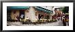 Tourists Sitting At A Sidewalk Cafe, Malcesine, Italy by Panoramic Images Limited Edition Print