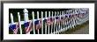 American Flags Hanging On A Picket Fence by Panoramic Images Limited Edition Print