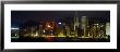 Buildings Lit Up At Night, Hong Kong, China by Panoramic Images Limited Edition Print
