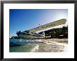 Float Plane On Beach, Hayman Island Resort, Whitsundays, Hayman Island, Queensland, Australia by Holger Leue Limited Edition Print