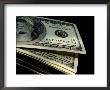 Close View Of A Stack Of One Hundred Dollar Bills by Todd Gipstein Limited Edition Print