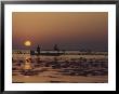 Fishermen Take In The First Rays Of The Rising Sun On Lake Okeechobee by Nicole Duplaix Limited Edition Print