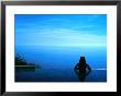 Silhouette Of Woman In Infinity Pool At Post Ranch Inn, Big Sur, Monterey Bay, Usa by Holger Leue Limited Edition Print