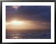 Sunlight Bursts Through Clouds Over The Open Water by Jason Edwards Limited Edition Print