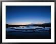 Sunset At Great Fountain Geyser In Yellowstone National Park by Norbert Rosing Limited Edition Print