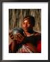 Boy Drinking Porridge From Clay Bowl, Mantenga Village, Swaziland by Ariadne Van Zandbergen Limited Edition Print
