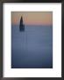 Morning Fog Obscures All But The Top Of A High Rise In Montevideo by Pablo Corral Vega Limited Edition Print