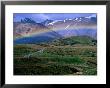 Rainbow Over Road Leading To Snow-Capped Mountains, Arthur's Pass National Park, New Zealand by Christopher Groenhout Limited Edition Print