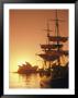 Sydney Opera House And The Hms Bounty, A Replica Of The Famous Ship, Silhouetted By The Setting Sun by Richard Nowitz Limited Edition Pricing Art Print