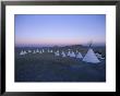 Teepees Sprinkle The Land In Choteau, Montana by O. Louis Mazzatenta Limited Edition Print