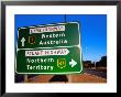 Road Sign For Eyre And Stuart Hghways, Australia by Gareth Mccormack Limited Edition Print