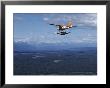 A Cessna Plane Flies Over Backcountry Air Lanes Near The Alaska Range by Ira Block Limited Edition Print