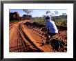 Cyclist On Outback Road, Purnululu National Park, Australia by Trevor Creighton Limited Edition Print