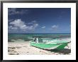 Boat And Turquoise Water On Pillory Beach, Turks And Caicos, Caribbean by Walter Bibikow Limited Edition Pricing Art Print