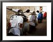 Vespas Parked In Narrow Street, Italy by Dallas Stribley Limited Edition Print