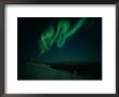 The Aurora Borealis Creates Fantastic Patterns Across The Evening Sky by Norbert Rosing Limited Edition Pricing Art Print