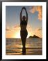 Woman Stretching On Beach by Tomas Del Amo Limited Edition Print