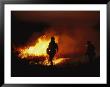 Firefighters Start A Controlled Fire On Prairie Land At Night by Joel Sartore Limited Edition Pricing Art Print
