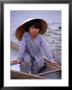 Girl In Canoe By Perfume River, Looking At Camera, Hue, Vietnam by Pershouse Craig Limited Edition Print