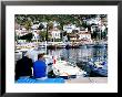 Fisherman At Marina, Kas, Turkey by Dallas Stribley Limited Edition Print