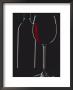 Studio Shot Of Back-Lit Glass And Bottle Of Red Wine by Lee Frost Limited Edition Pricing Art Print