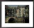 Junction Of Reguliersgracht And Keizersgracht Canals, Amsterdam, Holland by Adam Woolfitt Limited Edition Print